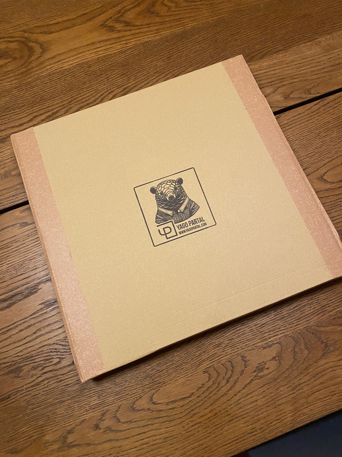 Closed kraft studio box with pangolin seal